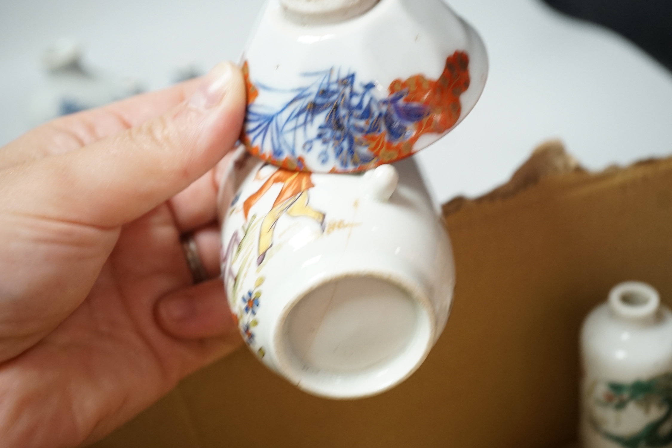 A group of Chinese porcelain snuff bottles and other export Chinese porcelain, an English porcelain cup, etc